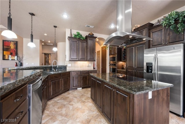 kitchen featuring dark brown cabinetry, sink, decorative light fixtures, appliances with stainless steel finishes, and island exhaust hood