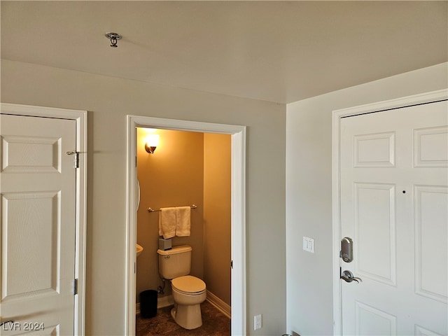 bathroom featuring toilet