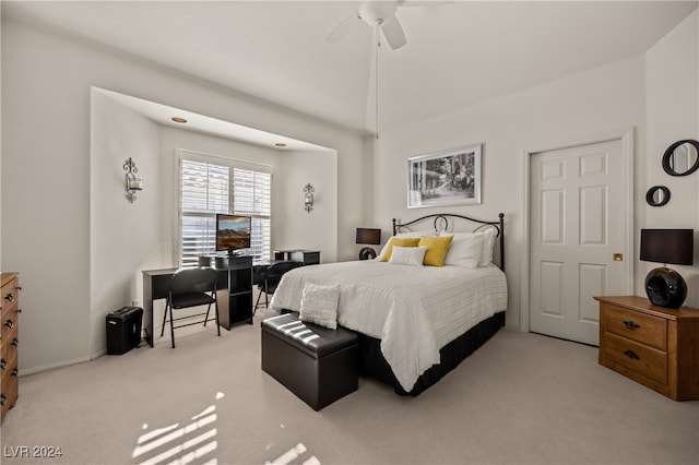 bedroom featuring ceiling fan and light colored carpet