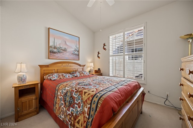 carpeted bedroom featuring ceiling fan and lofted ceiling