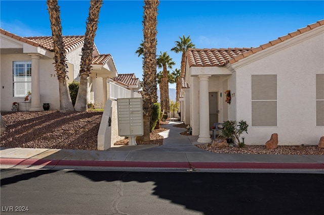 view of home's exterior with mail boxes