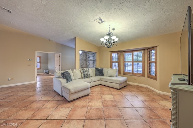 tiled living room with an inviting chandelier, vaulted ceiling, and a textured ceiling