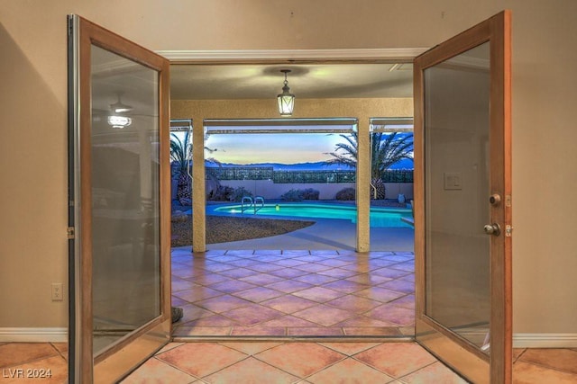 entryway with tile patterned flooring