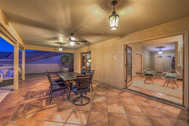 view of patio / terrace featuring ceiling fan