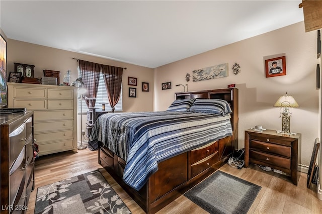 bedroom featuring light hardwood / wood-style floors