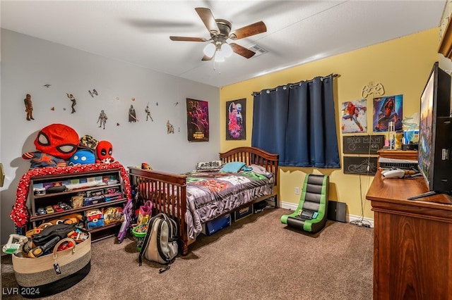 carpeted bedroom featuring ceiling fan