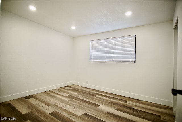 empty room featuring wood-type flooring