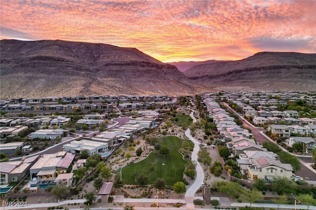 aerial view at dusk with a mountain view