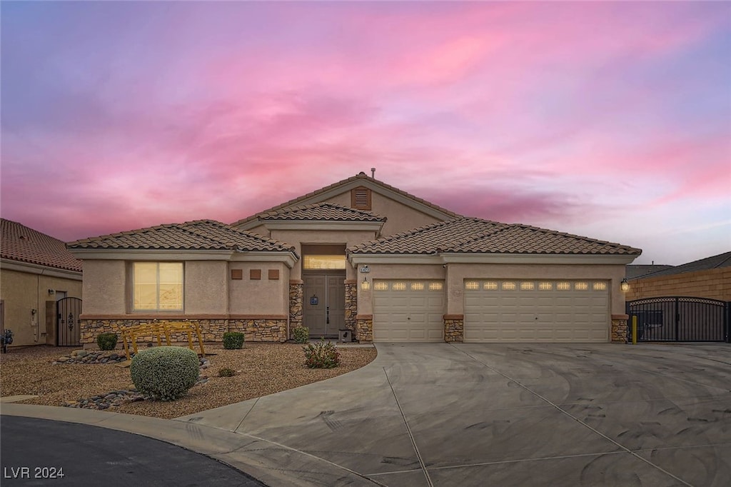 view of front of property with a garage