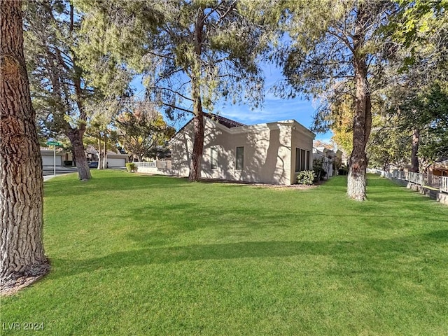 view of yard featuring fence