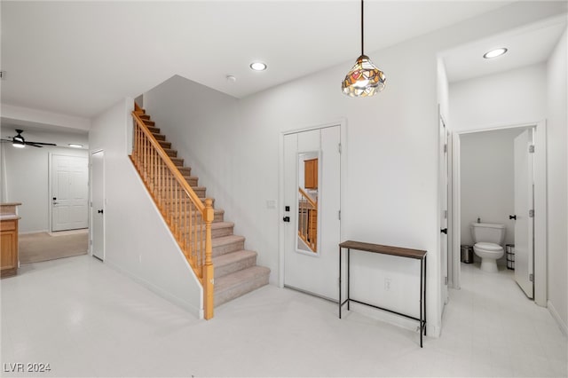 foyer with ceiling fan