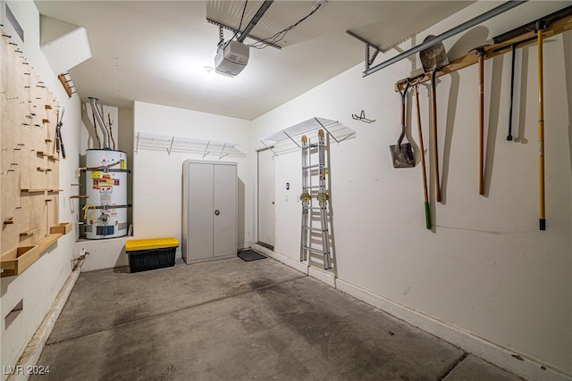 garage featuring strapped water heater and a garage door opener