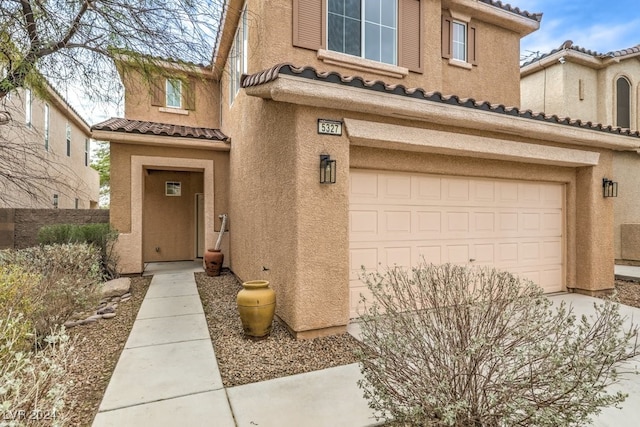 entrance to property with a garage