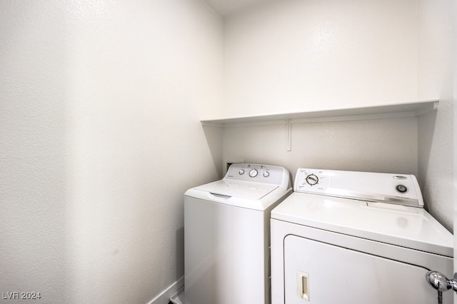 washroom with washer and clothes dryer