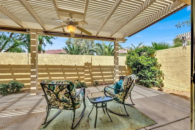 view of patio / terrace featuring a pergola and ceiling fan