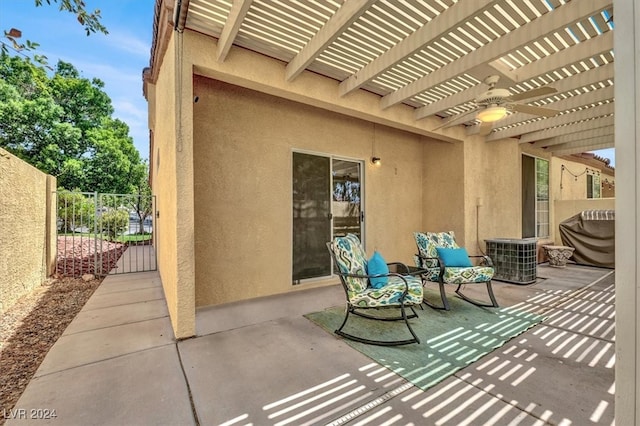 view of patio / terrace featuring ceiling fan, cooling unit, and a pergola