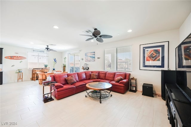 living room featuring ceiling fan, visible vents, and recessed lighting