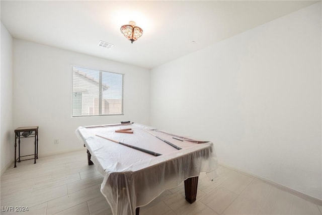 recreation room with billiards, visible vents, and baseboards