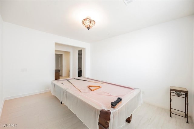 playroom featuring pool table and baseboards