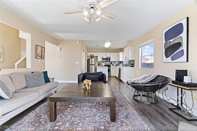 8213 Grassy Point Cir, Las Vegas, NV 89145 - living room featuring wood finished floors and a ceiling fan