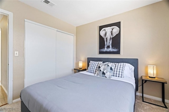 8213 Grassy Point Cir, Las Vegas, NV 89145 - bedroom featuring light carpet and a closet