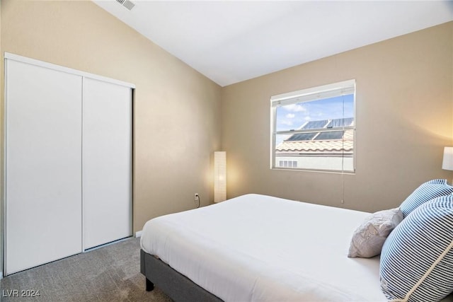 8213 Grassy Point Cir, Las Vegas, NV 89145 - bedroom featuring lofted ceiling, carpet flooring, and a closet