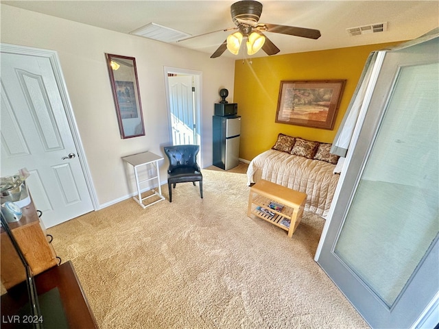 carpeted bedroom featuring ceiling fan