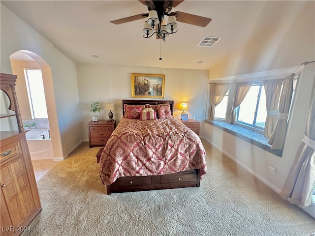 bedroom featuring ceiling fan and light colored carpet