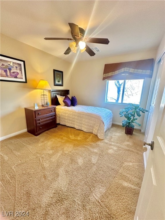 bedroom featuring carpet and ceiling fan