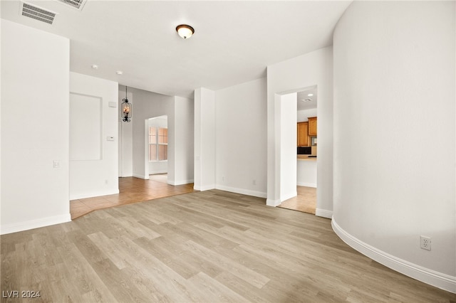 empty room featuring light hardwood / wood-style floors