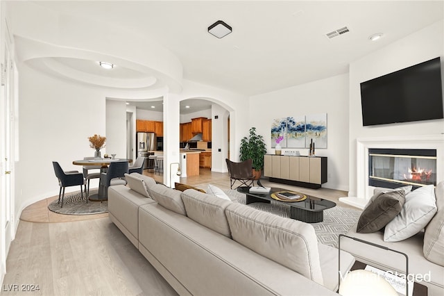 living room featuring light wood-type flooring