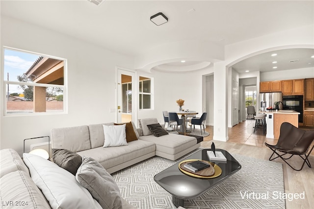 living room with light hardwood / wood-style floors