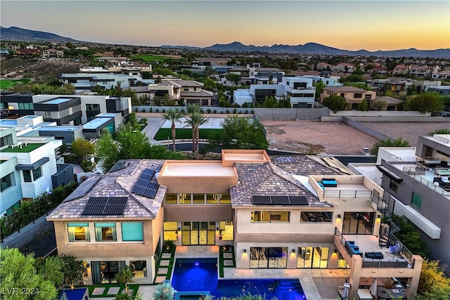 aerial view at dusk with a mountain view