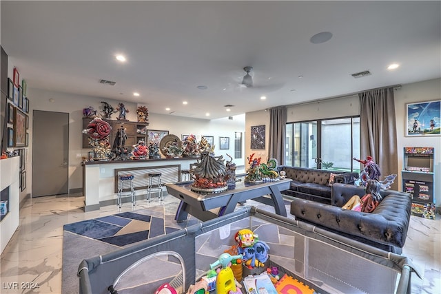 living room with ceiling fan