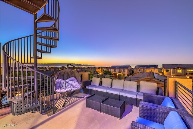 patio terrace at dusk with outdoor lounge area