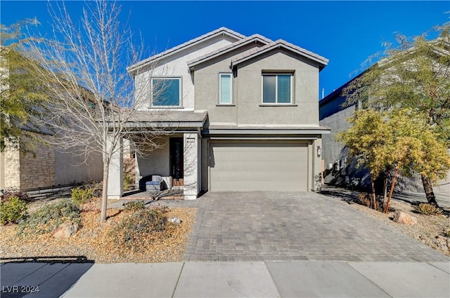 front of property featuring a garage