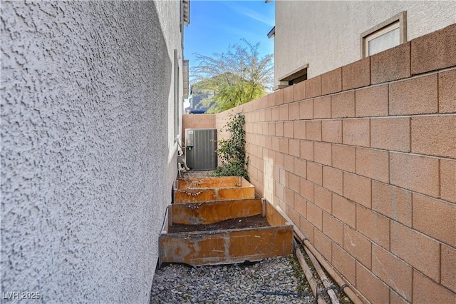 view of property exterior with cooling unit