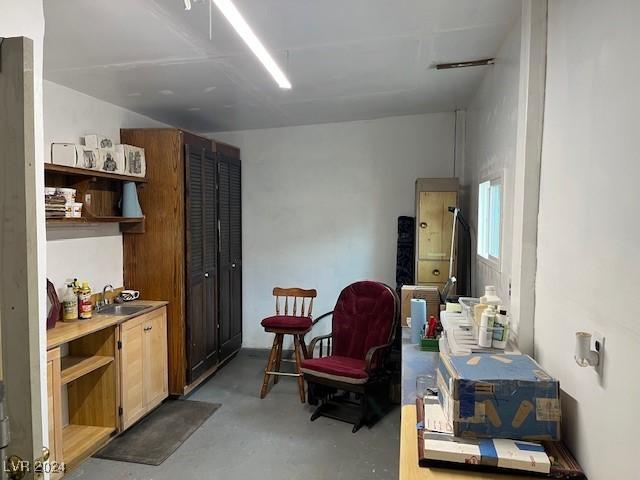 interior space with concrete flooring and sink