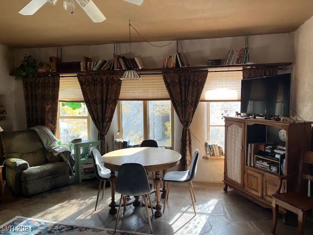 dining area with ceiling fan