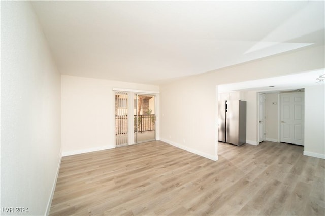5260 River Glen Dr Unit 261, Las Vegas, NV 89103 - spare room with light wood-style floors and baseboards