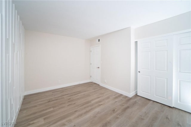 5260 River Glen Dr Unit 261, Las Vegas, NV 89103 - empty room with light wood finished floors and baseboards