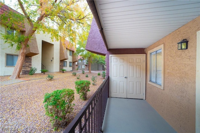 5260 River Glen Dr Unit 261, Las Vegas, NV 89103 - property entrance with stucco siding