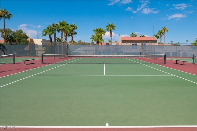 view of tennis court with basketball court