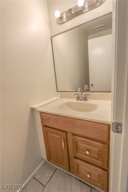 bathroom featuring vanity and tile patterned floors