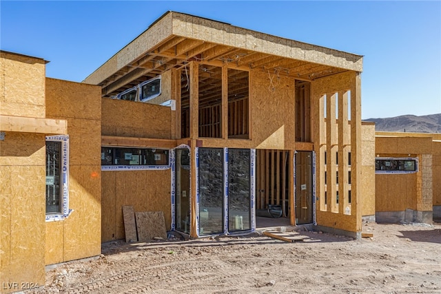 exterior space featuring a mountain view