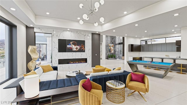 interior space with pool table, a fireplace, and recessed lighting