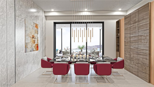 dining room featuring recessed lighting