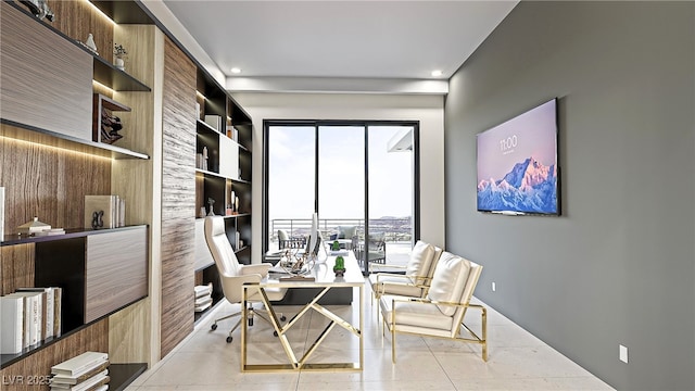 office space featuring built in shelves, light tile patterned flooring, and recessed lighting