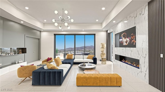 1487 Reims Dr, Henderson, NV 89012 - living room featuring a premium fireplace, recessed lighting, tile patterned floors, and a notable chandelier