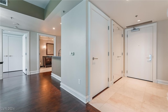 hall featuring light hardwood / wood-style floors